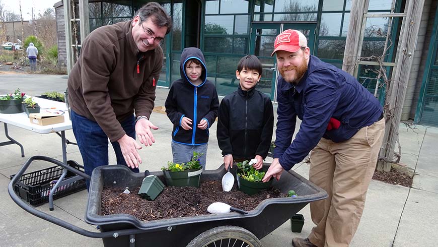 dads and sons planting