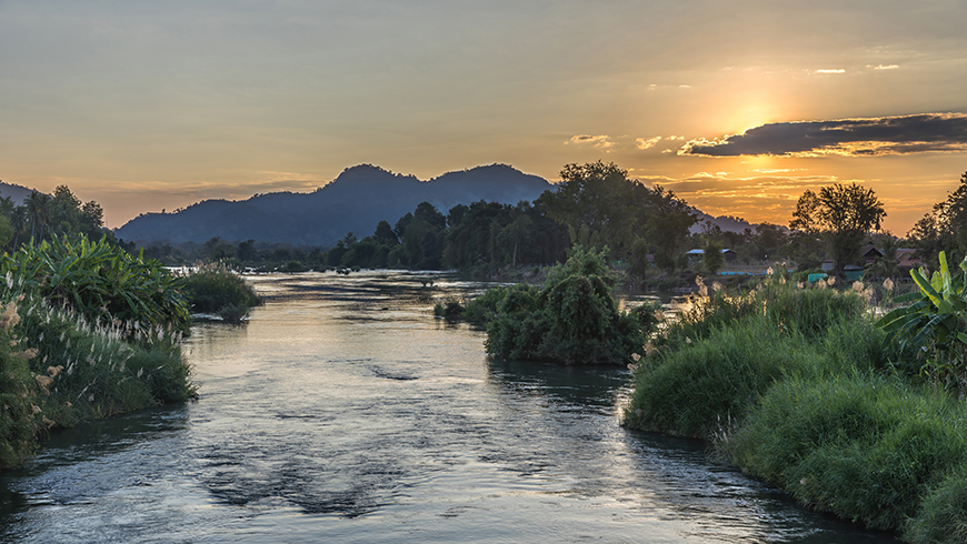 sunset over the Mekong River, photographer Basile Morin