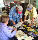 The labelers and mappers - Carolyn Fagan, Tom Bumgarner, and Bill Satterwhite (left to right). Volunteers Patrice Cooke, Margaret Jordan, Laddie Munger, and Dora Zia are not shown.