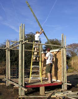 Tom Murray (on ladder) and Cliff Reid frame the tsunami shelter.