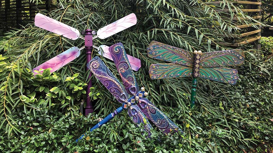 dragonflies made out of ceiling fan blades and stair banister