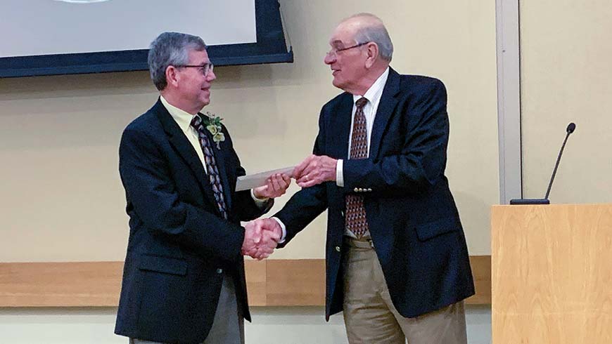 Bob Lyons receiving Scott Medal and Award